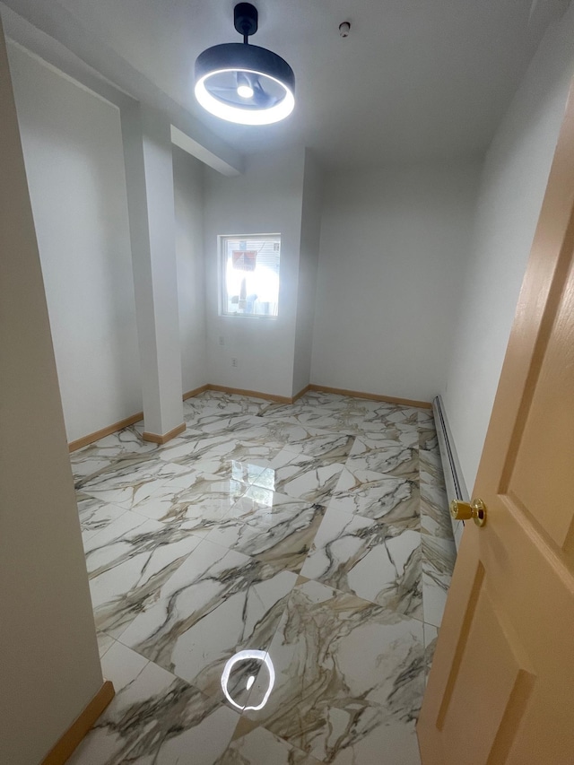 2907 Central Ave, Union City, NJ 07087 - spare room with baseboard heating and a smoke detector