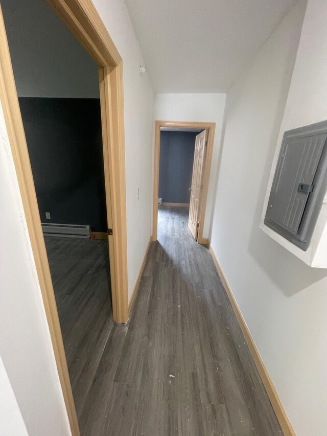 2907 Central Ave, Union City, NJ 07087 - corridor with dark wood finished floors, baseboard heating, and electric panel
