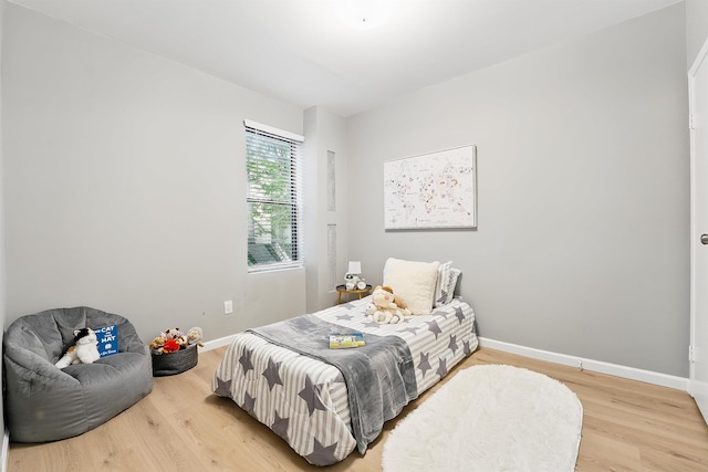 29 51st St Unit A2, Weehawken, NJ 07086 - bedroom with wood finished floors and baseboards