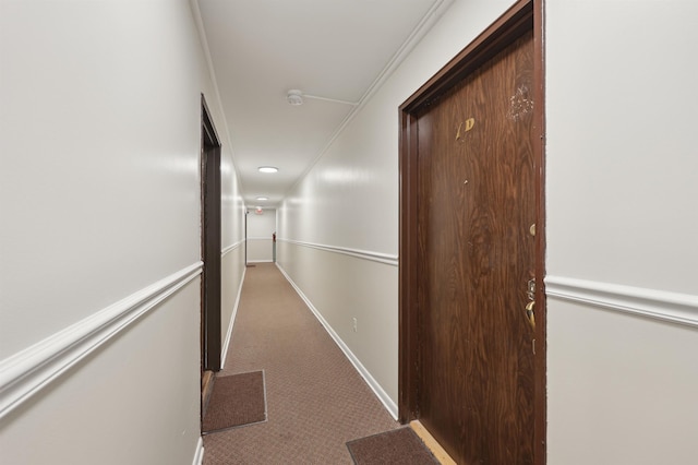 hall with carpet flooring