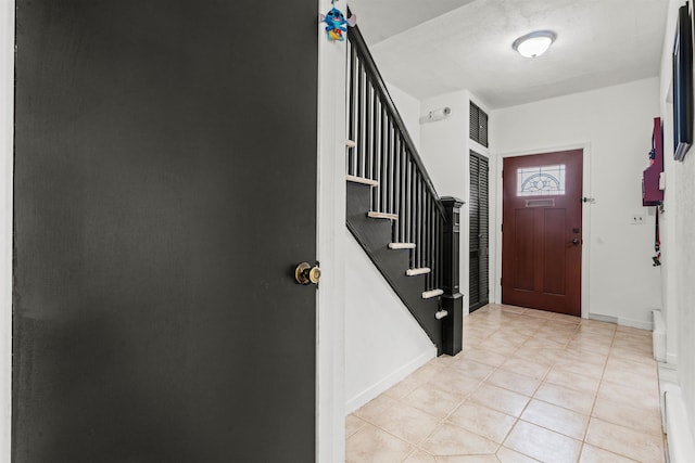 view of tiled entrance foyer