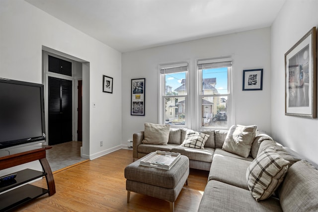 living room with light hardwood / wood-style floors