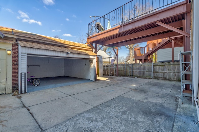 garage featuring fence