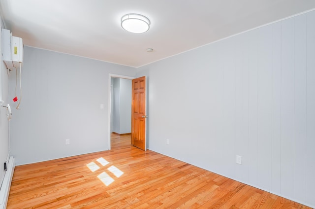 unfurnished bedroom with light wood finished floors