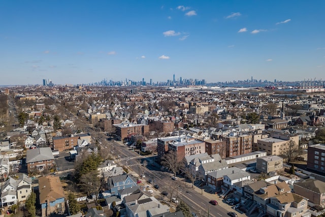 birds eye view of property with a city view