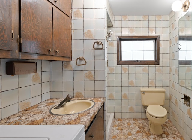 71 W 17th St, Bayonne, NJ 07002 - bathroom featuring vanity, tile walls, tile patterned floors, and backsplash