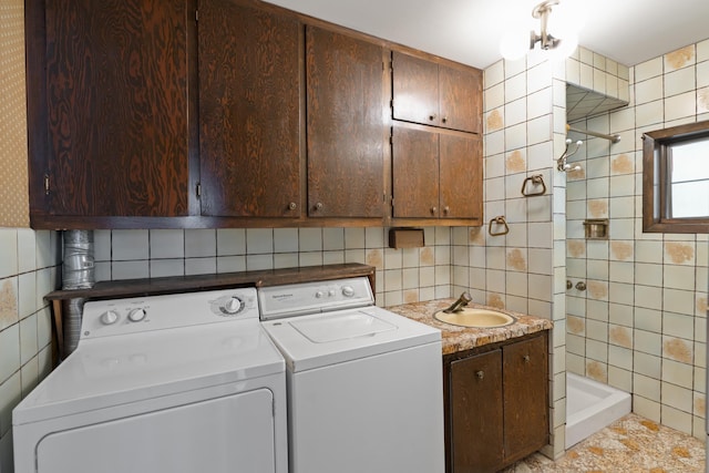 71 W 17th St, Bayonne, NJ 07002 - laundry area with washer and clothes dryer and tile walls