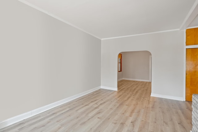 71 W 17th St, Bayonne, NJ 07002 - unfurnished room with arched walkways, light wood-style flooring, and ornamental molding
