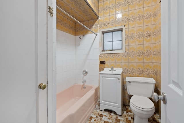 71 W 17th St, Bayonne, NJ 07002 - bathroom featuring bathtub / shower combination, vanity, and tile walls