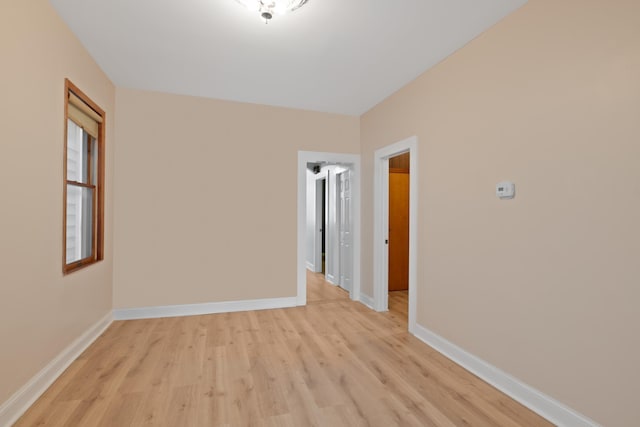 71 W 17th St, Bayonne, NJ 07002 - spare room with light wood finished floors and baseboards