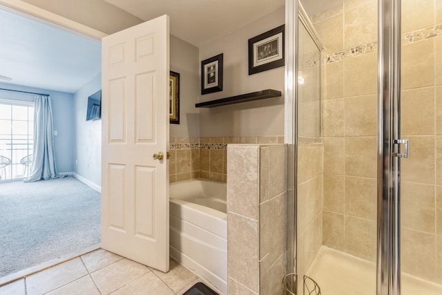 bathroom with tile patterned flooring and plus walk in shower