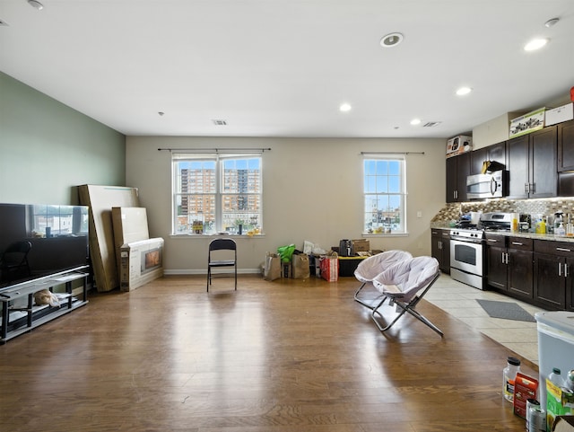 1201 Summit Ave Unit 402, Jersey City, NJ 07307 - living area featuring light wood-style floors and recessed lighting