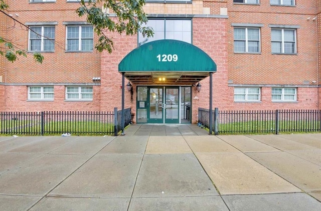 1201 Summit Ave Unit 402, Jersey City, NJ 07307 - doorway to property featuring brick siding and french doors