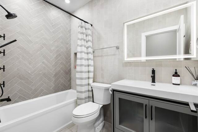 23 Manhattan Ave Unit 1, Jersey City, NJ 07307 - full bathroom featuring shower / bath combination with curtain, vanity, toilet, and tile walls