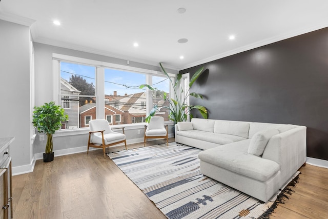 23 Manhattan Ave Unit 1, Jersey City, NJ 07307 - living room featuring crown molding, baseboards, light wood-type flooring, and recessed lighting