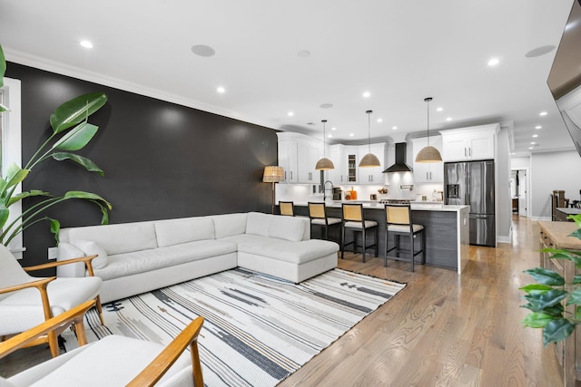 23 Manhattan Ave Unit 1, Jersey City, NJ 07307 - living area featuring recessed lighting, wood finished floors, and ornamental molding