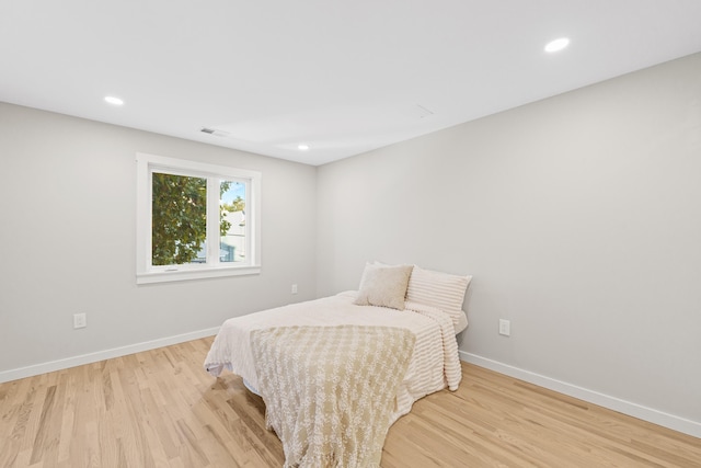 312 Garfield Ave Unit 2, Jersey City, NJ 07305 - bedroom with light wood-style flooring and recessed lighting