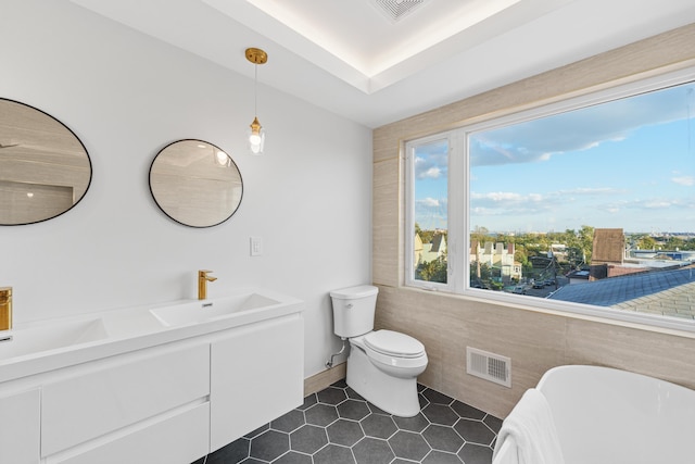 312 Garfield Ave Unit 2, Jersey City, NJ 07305 - full bath featuring a freestanding bath, double vanity, and tile patterned floors
