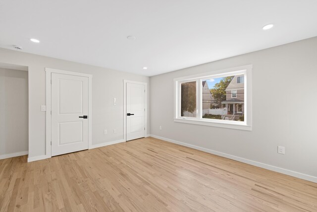 312 Garfield Ave Unit 2, Jersey City, NJ 07305 - unfurnished bedroom featuring light wood finished floors and recessed lighting