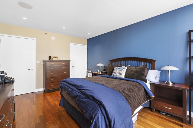 20 Newport Pkwy Unit 1108, Jersey City, NJ 07310 - bedroom with recessed lighting and wood finished floors