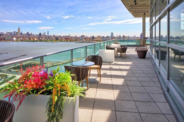 20 Newport Pkwy Unit 1108, Jersey City, NJ 07310 - balcony with a city view and a water view