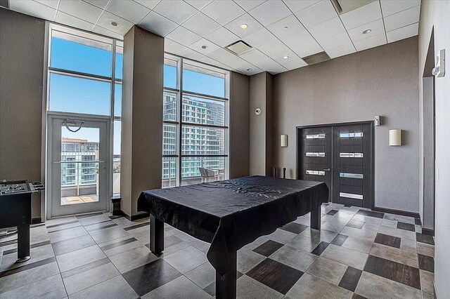 20 Newport Pkwy Unit 1108, Jersey City, NJ 07310 - game room featuring tile patterned floors, billiards, a drop ceiling, and a high ceiling