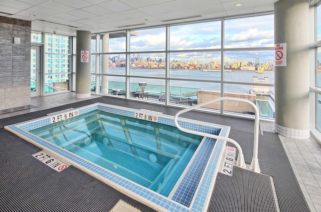 20 Newport Pkwy Unit 1108, Jersey City, NJ 07310 - view of pool featuring a water view and an indoor hot tub