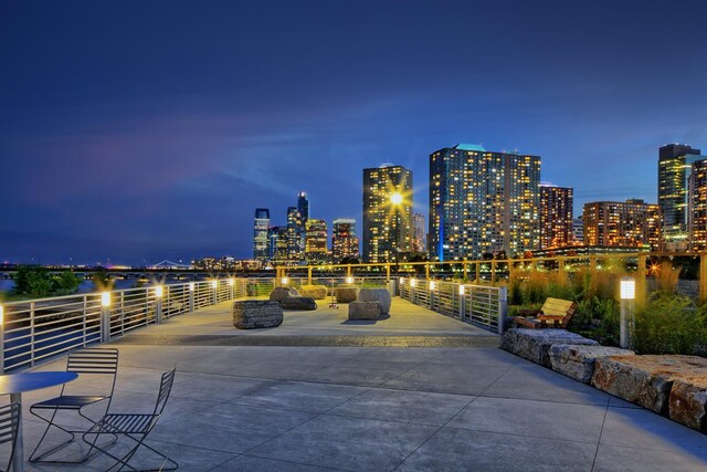 20 Newport Pkwy Unit 1108, Jersey City, NJ 07310 - patio at night featuring a view of city lights