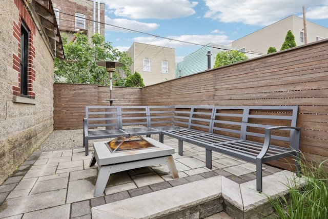 7619 5th Ave, North Bergen, NJ 07047 - fenced backyard with a fire pit and a patio