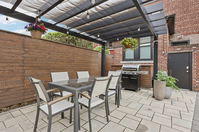 7619 5th Ave, North Bergen, NJ 07047 - view of patio / terrace with grilling area, outdoor dining area, and a pergola