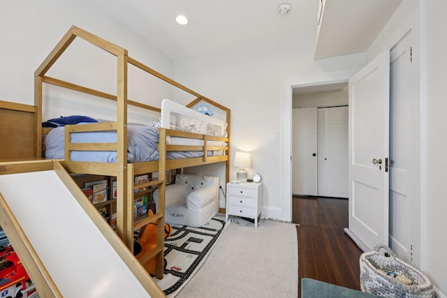 7619 5th Ave, North Bergen, NJ 07047 - bedroom featuring baseboards and wood finished floors