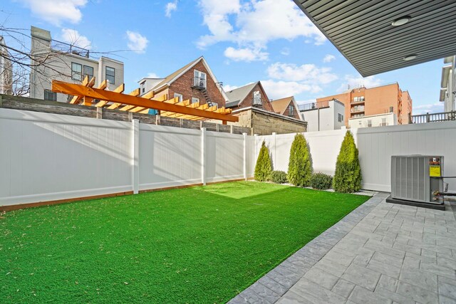81 Webster Ave Unit 1, Jersey City, NJ 07307 - fenced backyard with a patio area