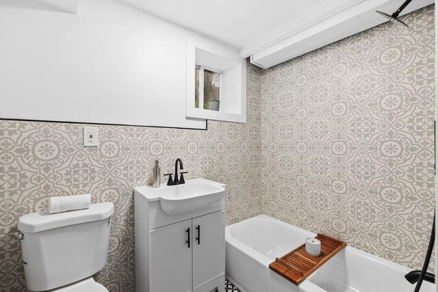 48 Armstrong Ave, Jersey City, NJ 07305 - bathroom with vanity and wallpapered walls