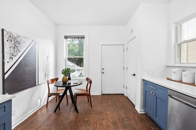 48 Armstrong Ave, Jersey City, NJ 07305 - dining room featuring dark wood-style floors and baseboards