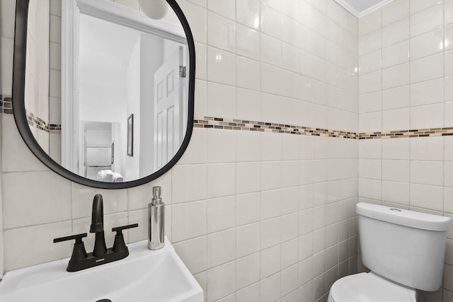 48 Armstrong Ave, Jersey City, NJ 07305 - bathroom featuring tile walls and a sink