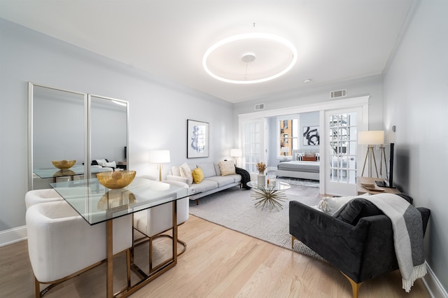 living room with light hardwood / wood-style floors