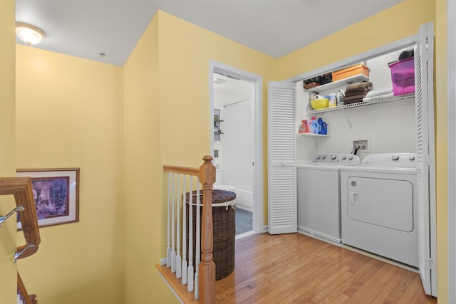 6 Elco Ct, Bayonne, NJ 07002 - washroom featuring washer and clothes dryer and light wood-type flooring