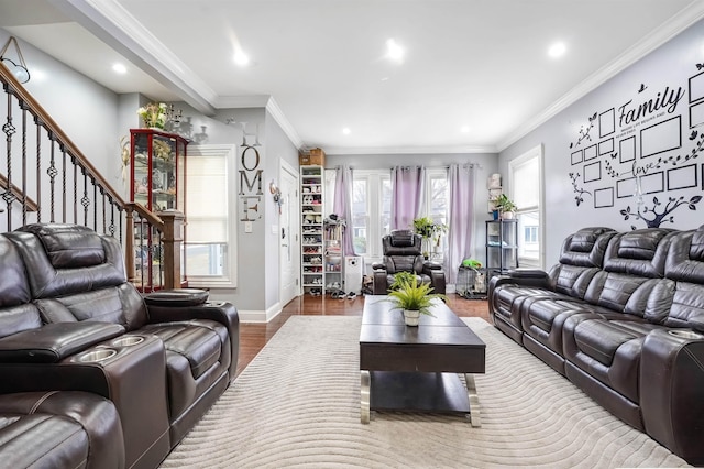 living area featuring ornamental molding, wood finished floors, recessed lighting, baseboards, and stairs