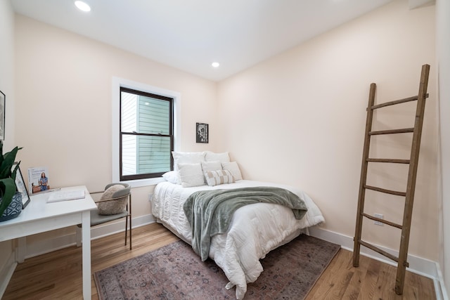 247 Harrison Ave Unit 2, Jersey City, NJ 07304 - bedroom with wood finished floors, baseboards, and recessed lighting
