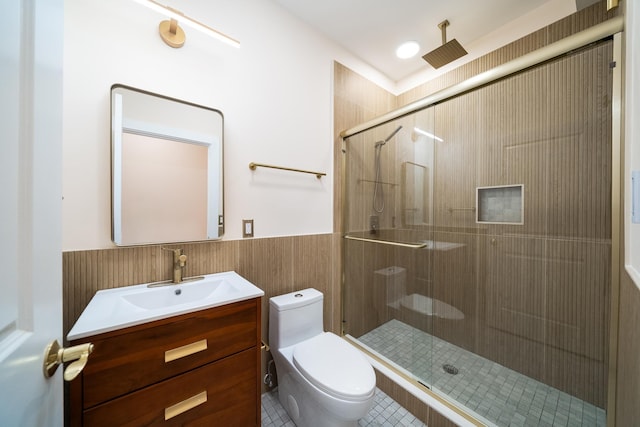 247 Harrison Ave Unit 2, Jersey City, NJ 07304 - bathroom with toilet, vanity, a shower stall, and wainscoting