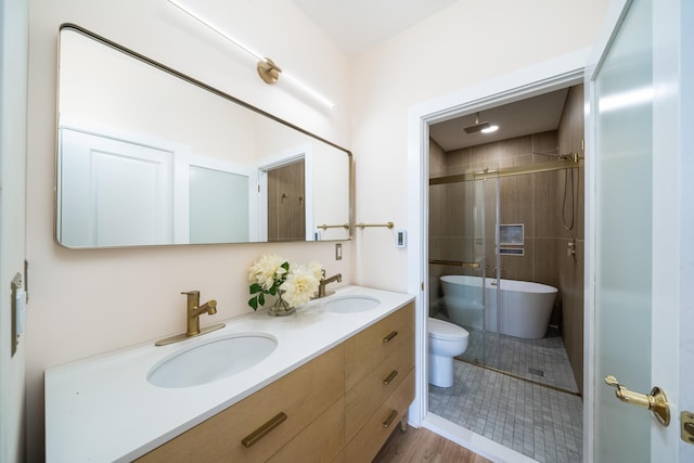 247 Harrison Ave Unit 2, Jersey City, NJ 07304 - full bathroom with double vanity, toilet, and a tile shower