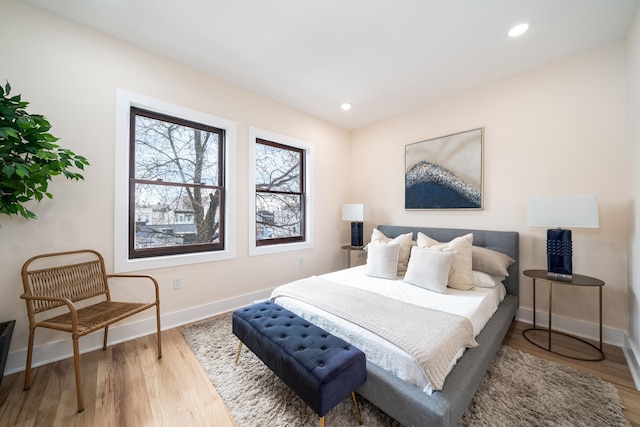 247 Harrison Ave Unit 2, Jersey City, NJ 07304 - bedroom featuring baseboards, wood finished floors, and recessed lighting
