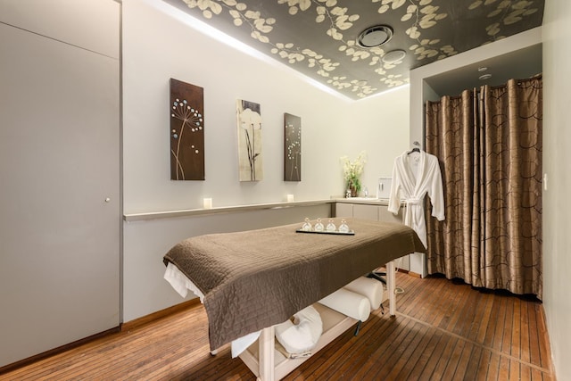 bedroom featuring hardwood / wood-style flooring