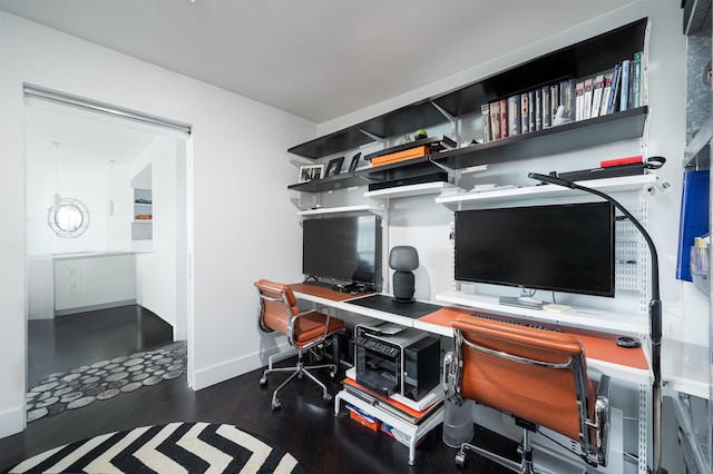 office space with dark hardwood / wood-style flooring