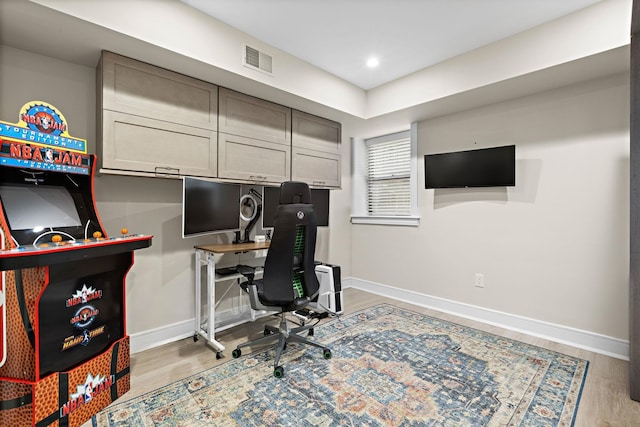 1030 Hudson St Unit 1, Hoboken, NJ 07030 - home office featuring wood finished floors and baseboards