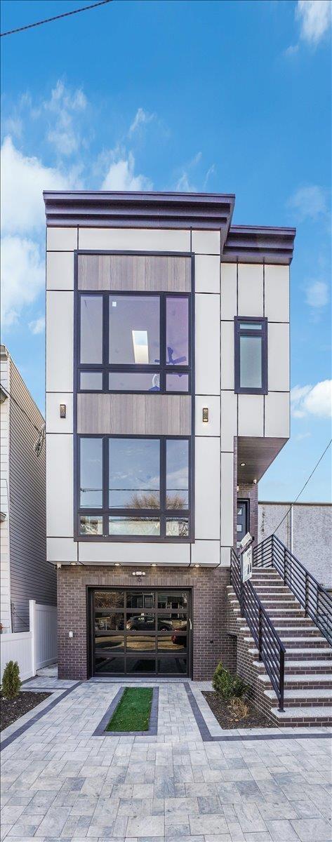 177 Wilkinson Ave Unit 1, Jersey City, NJ 07305 - view of front of house featuring brick siding