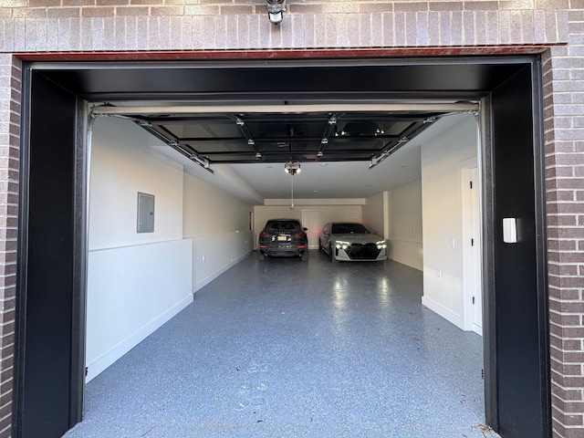 177 Wilkinson Ave Unit 1, Jersey City, NJ 07305 - garage with baseboards and electric panel