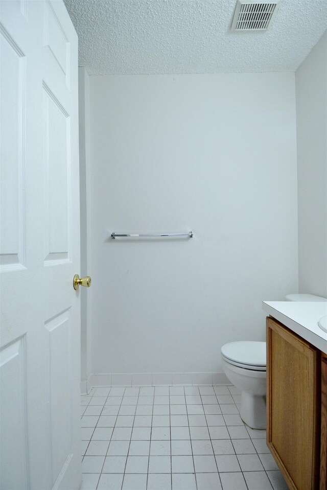 111 Watson Ct, Howell Township, NJ 07731 - bathroom featuring a textured ceiling, vanity, toilet, and baseboards