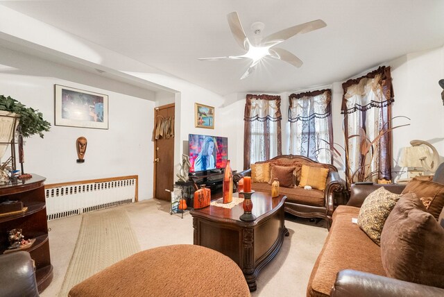 57 Wegman Pkwy, Jersey City, NJ 07305 - living area featuring radiator, carpet floors, and ceiling fan
