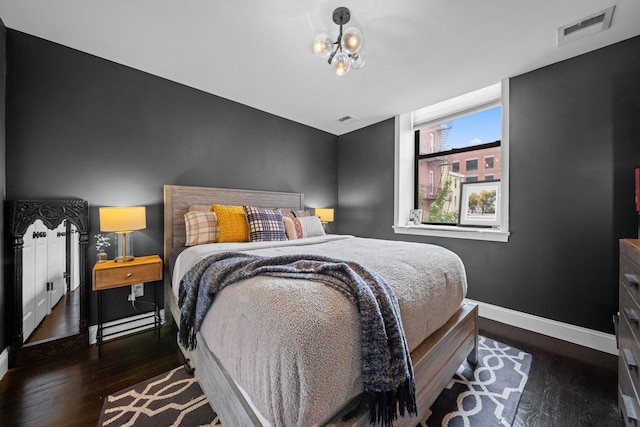 222 Clinton St Unit 23, Hoboken, NJ 07030 - bedroom featuring baseboards and wood finished floors